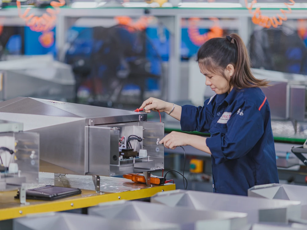 Komaspec technician inspecting complex box build electromechanical assembly line