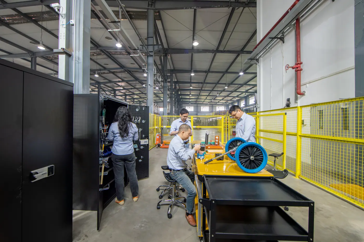 Komaspec team working on a product prototype during the NPI process